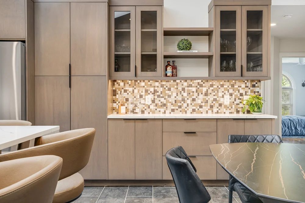 Glass-front bar cabinets with open shelving