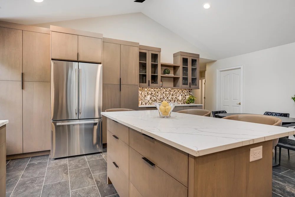 Tall pantry wall and drawer-stacked island