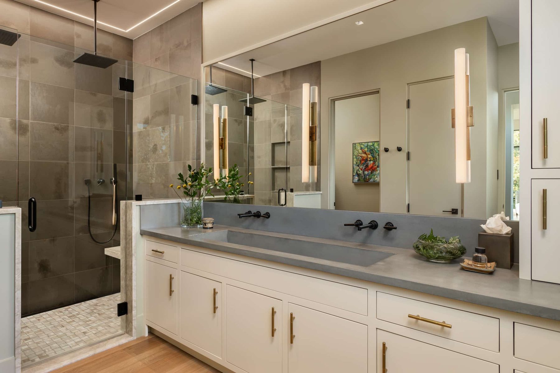 Painted double vanity with a concrete trough sink