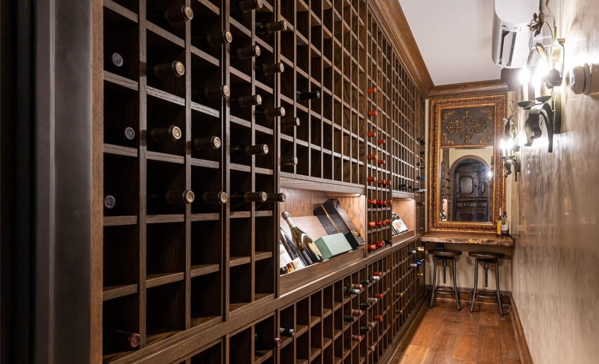 Bottle cubbies with lit display shelves